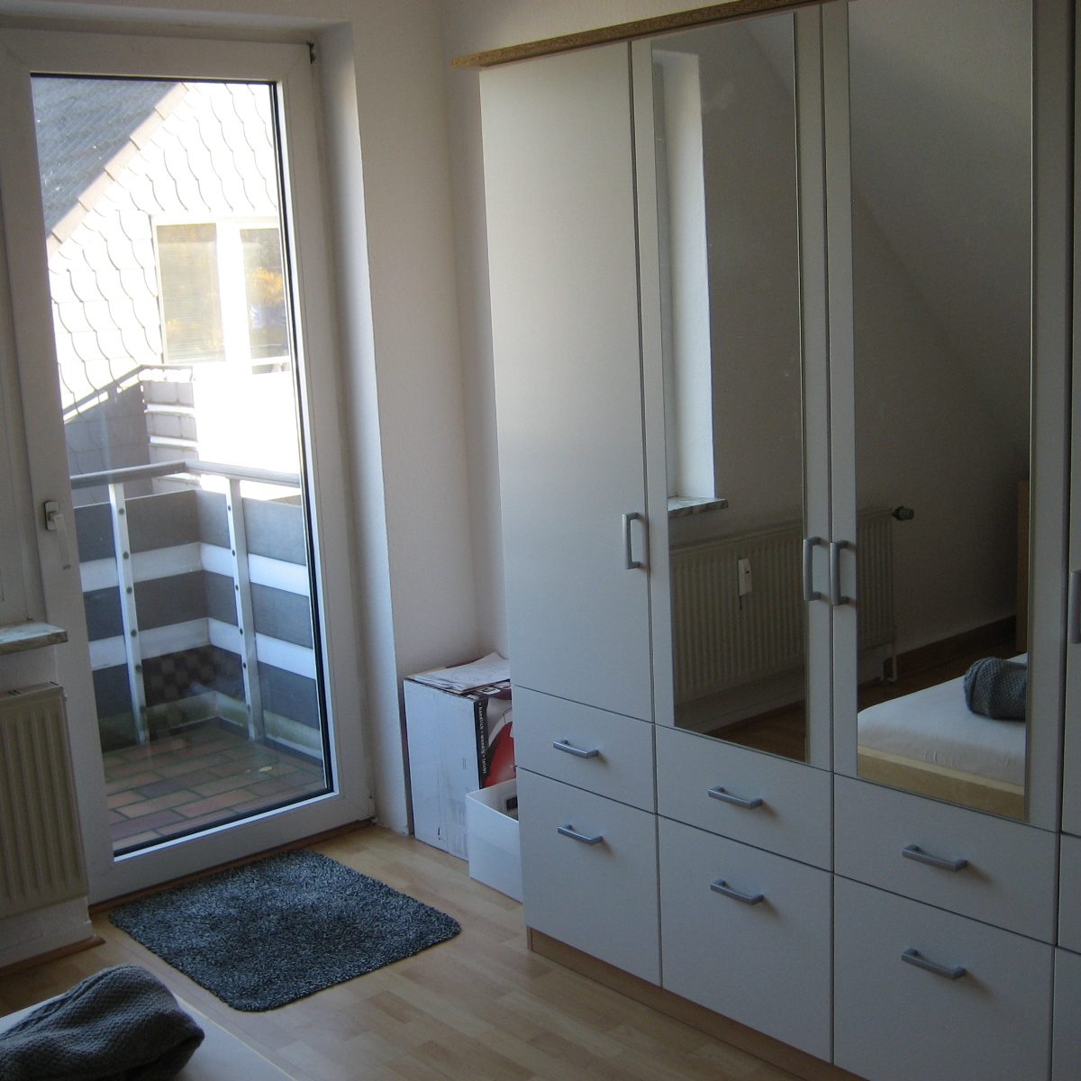 Schlafzimmer mit Balkon